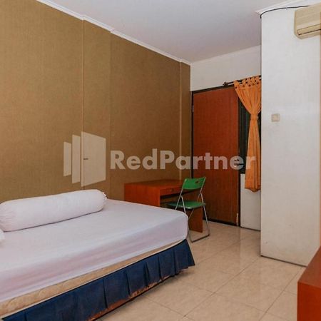 Отель De Lugano Scbd Syariah Mitra Reddoorz Джакарта Экстерьер фото