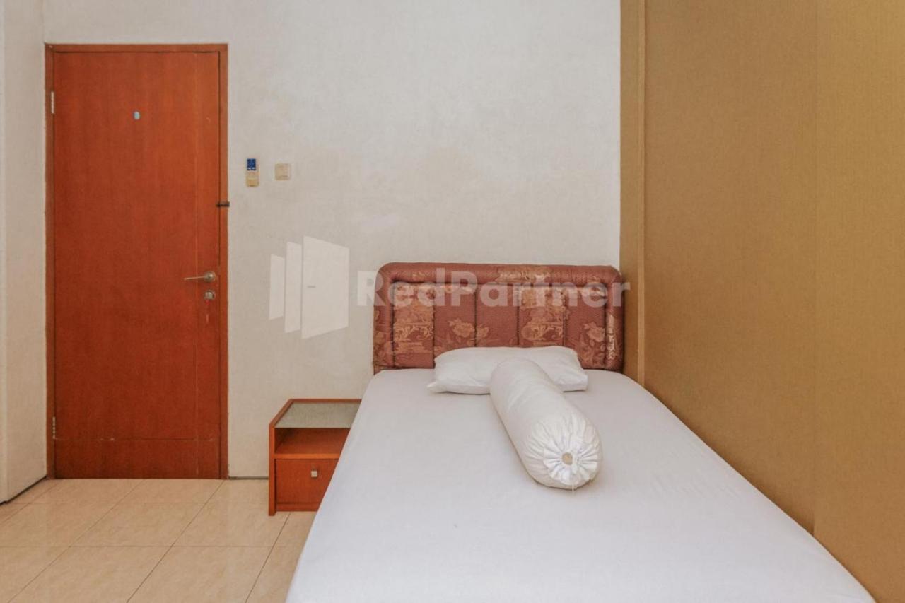 Отель De Lugano Scbd Syariah Mitra Reddoorz Джакарта Экстерьер фото