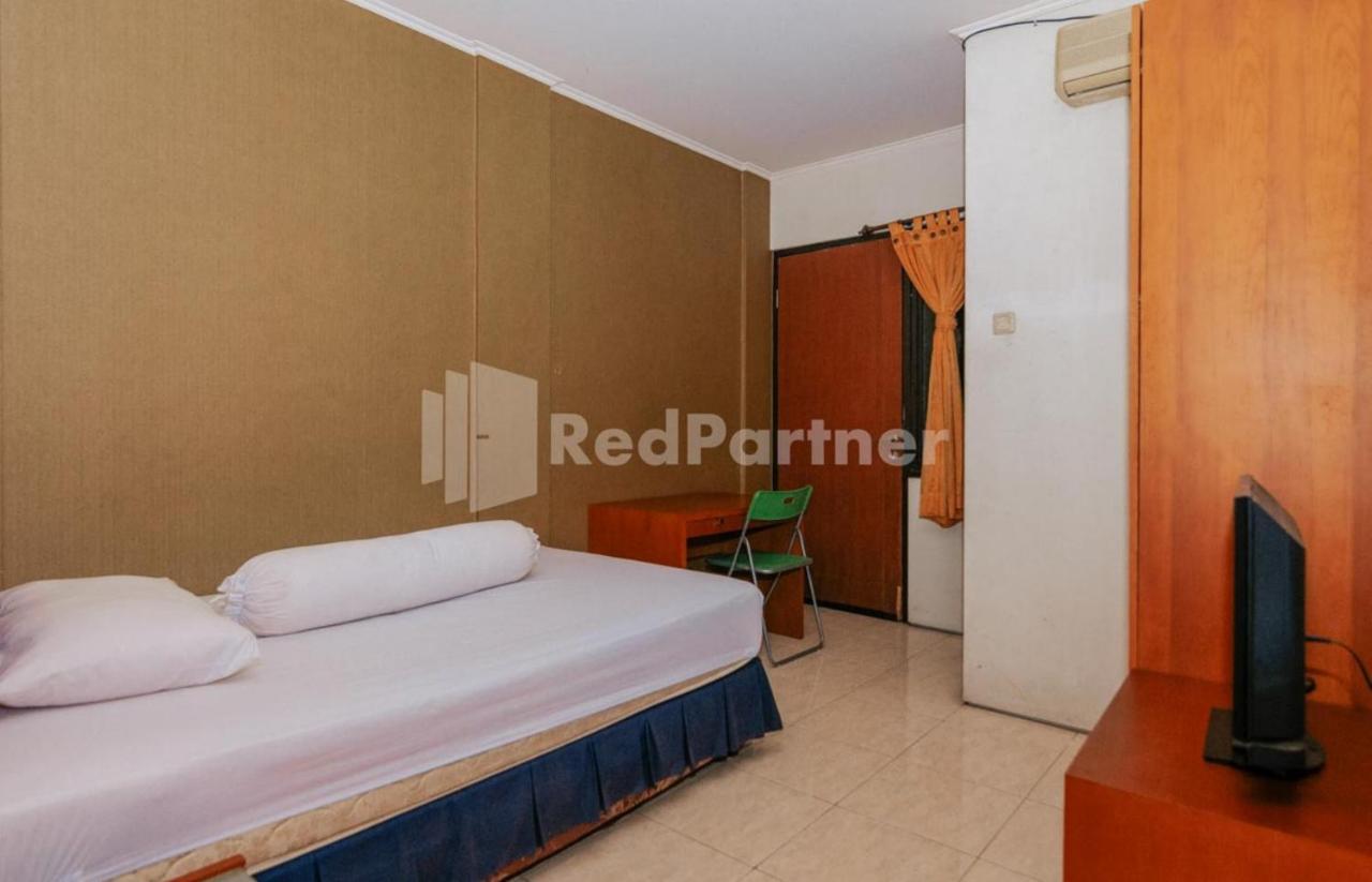 Отель De Lugano Scbd Syariah Mitra Reddoorz Джакарта Экстерьер фото