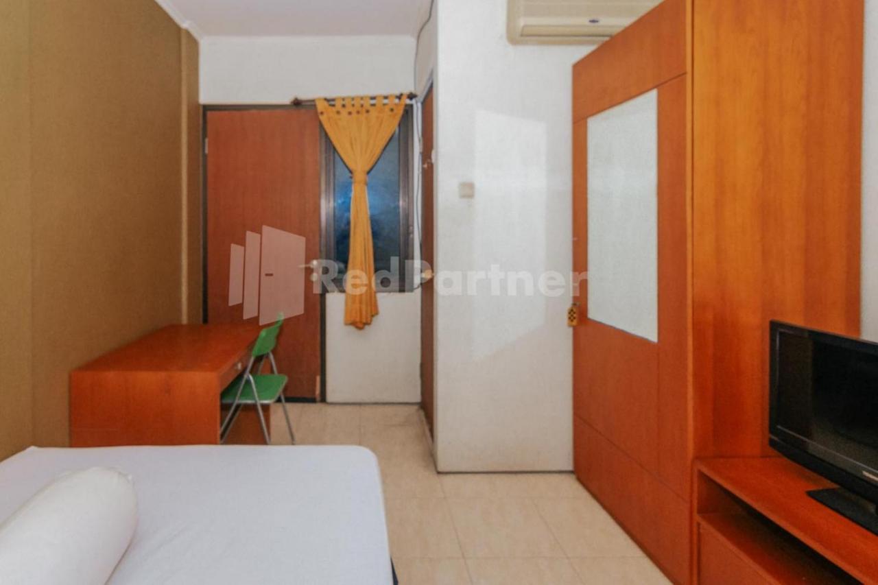 Отель De Lugano Scbd Syariah Mitra Reddoorz Джакарта Экстерьер фото