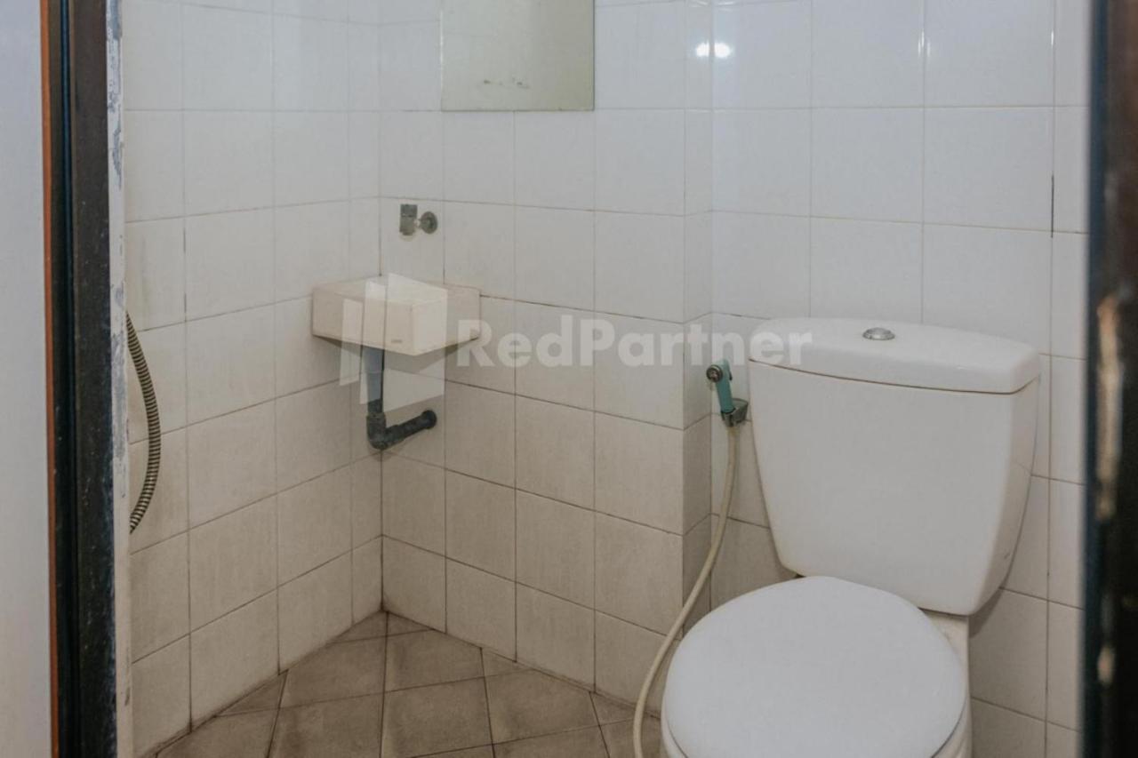 Отель De Lugano Scbd Syariah Mitra Reddoorz Джакарта Экстерьер фото
