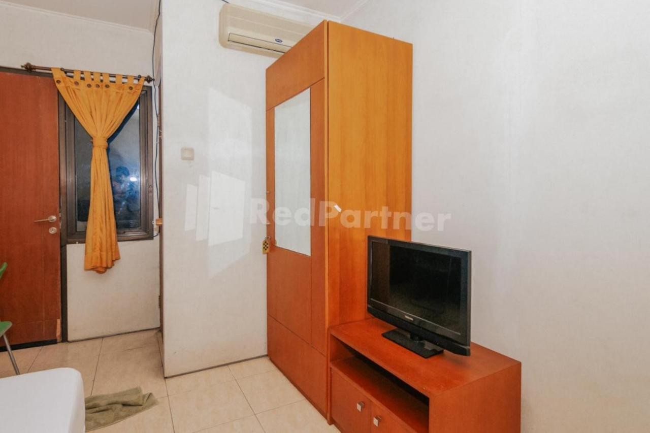 Отель De Lugano Scbd Syariah Mitra Reddoorz Джакарта Экстерьер фото