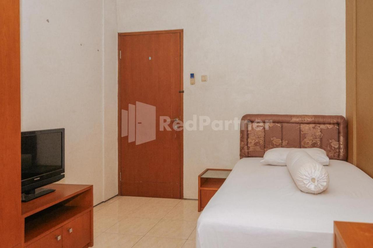 Отель De Lugano Scbd Syariah Mitra Reddoorz Джакарта Экстерьер фото